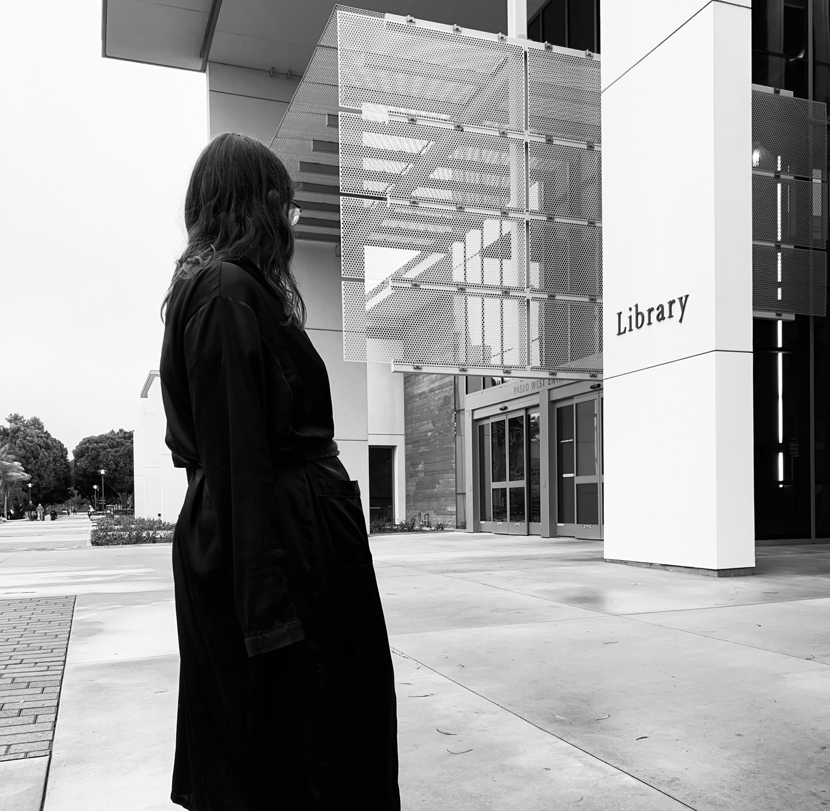 Macoy looks up at the looming Library!