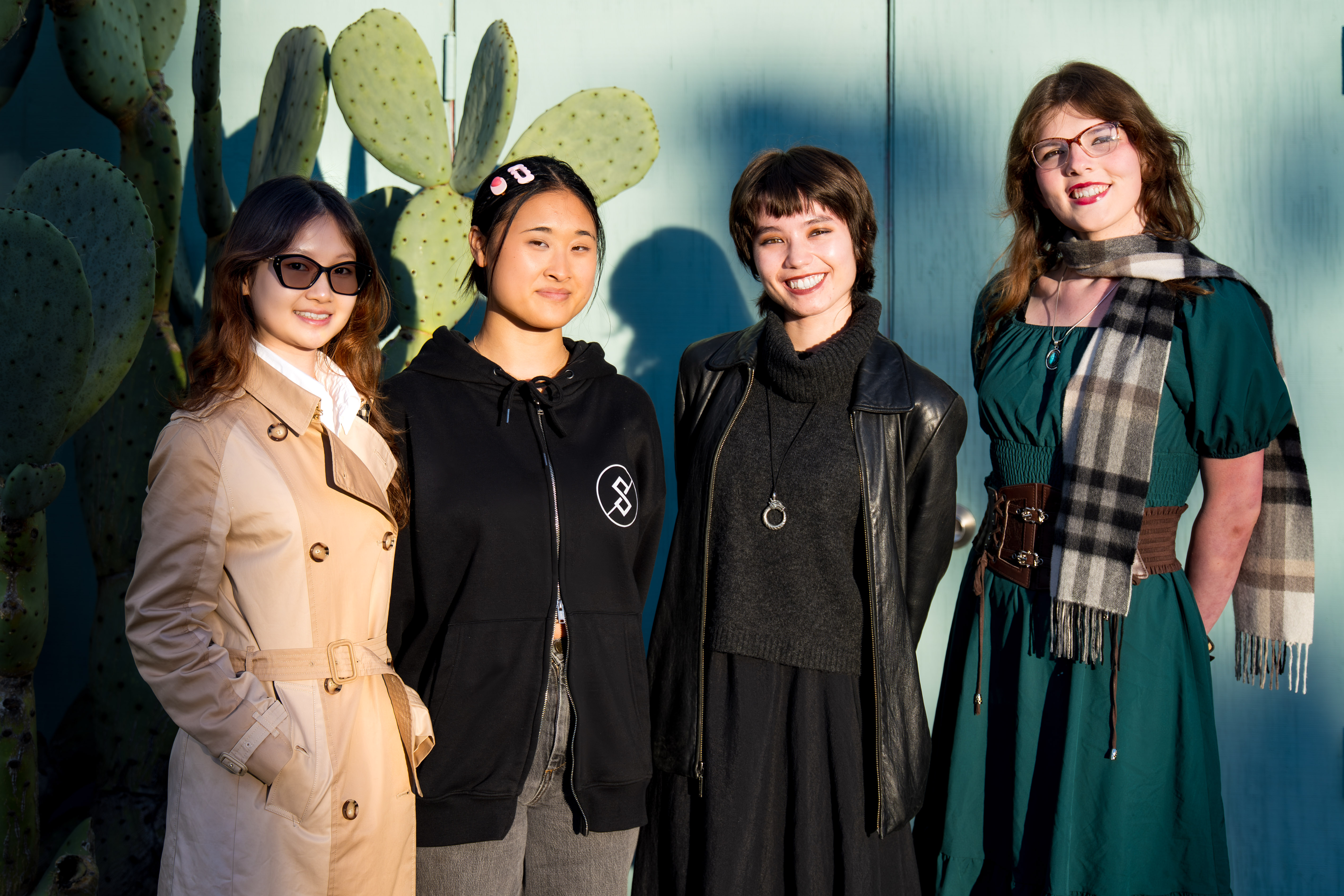 Spectrum 2025-26 Editorial Board, left to right: Yoyo Na Huang, Caitlyn Lee, Makenna Arase and Macoy Greco